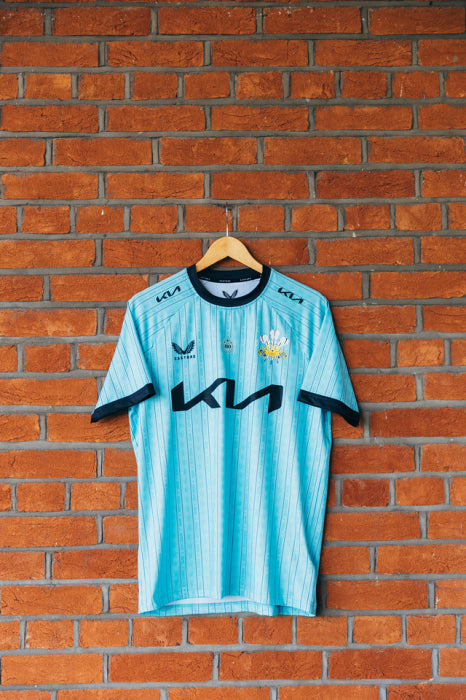 Surrey Castore Youth 2025 T20 Shirt Short Sleeve (Duck Egg Blue)